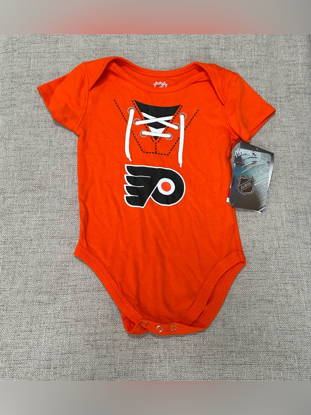 NHL Philadelphia Flyers Orange Lace-Up Logo Baby Bodysuit. 24m